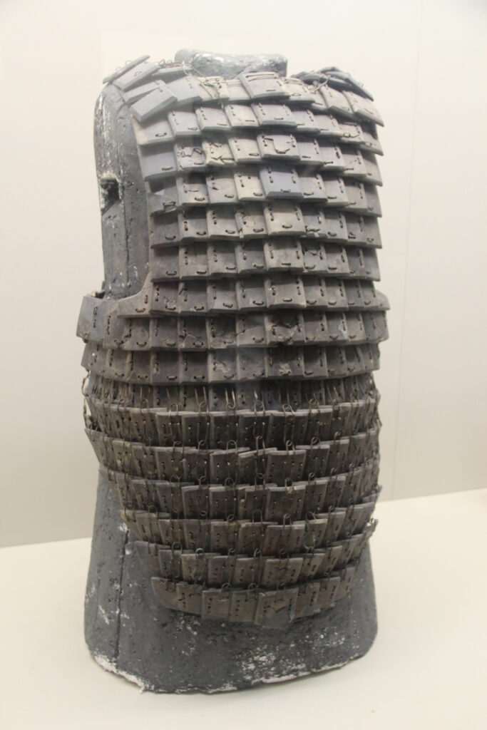 Qin stone armor assembled from overlapping limestone plates